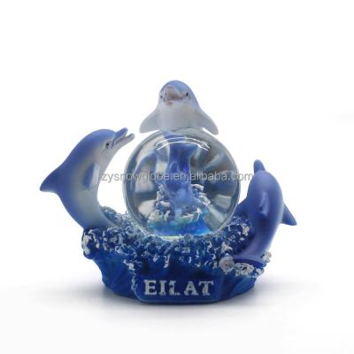 China New Design Public Resin Dolphin Snow Globe With Glitter for sale