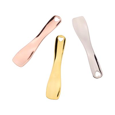 China Blood Vessels Removal China Wholesale Skin Care Mini Beauty Gold Cosmetic Face Cream Spoon for sale