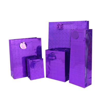 China Low Cost Recyclable Custom Recyclable Special Hologram Retail Gift Bag Special Solid Purple Paper Bags With Logo for sale