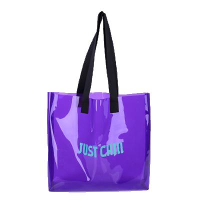 China Fancy PVC Tote Shopping Bag Handled Purple Transparent Tote Bag for sale