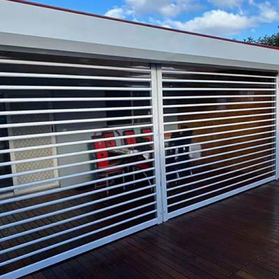 China Modern Transparent Bar Crystal Polycarbonate Rolling Shutter Door Manufacturer For Shops for sale