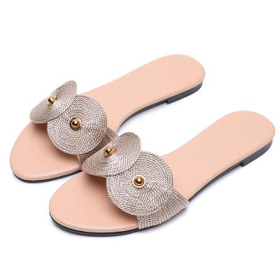 China 2021 fashion trend personalized woven slip on slippers female outdoor ladies flat sandals for sale