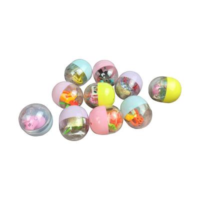 China Children's promotional toys 47x55mm ball toys elastic twist doll eggs toy coin arcade twisting machine viscous transparent eggs for sale