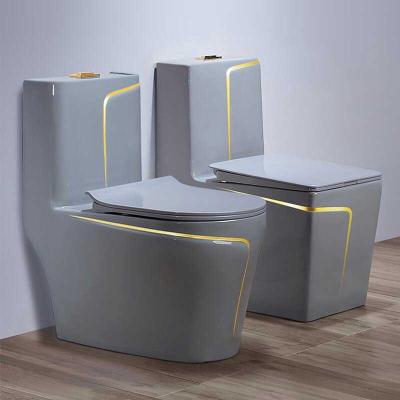 China High Quality One Piece Line Double-Flow Gold Ceramic Toilet for sale