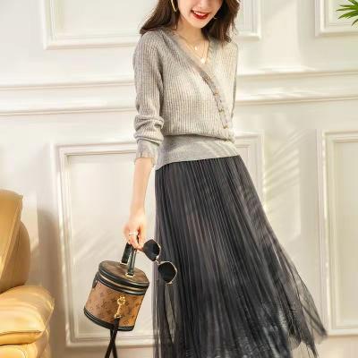 China Autumn new fashion anti-pilling and elegant women's long-sleeved v-neck knit pullover sweater pleated net yarn skirt knitted two-piece set for sale