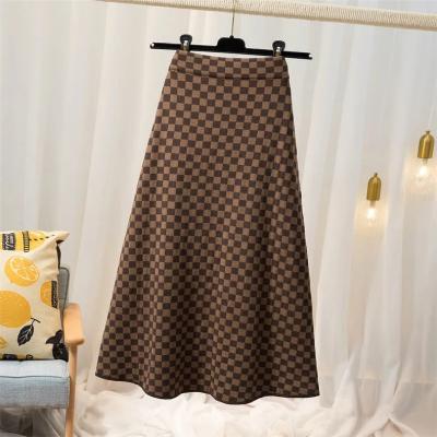 China Autumn And Winter Classic Heckerboard Knitted Skirt High Waist Large Swing Women'S Retro Anti-Static Customizable Skirt Mid Length Skirt Line One Line for sale