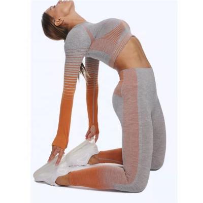 China New Wholesale Breathable Women's Sports Spring And Autumn Fitness Seamless Knitted Striped Hip Lift Up Long Sleeve s High Elastic Yoga Clothes for sale