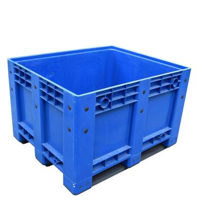 China Solid 600L scatola storage DA pallet single sided plastic pallet box container with wheels for sale