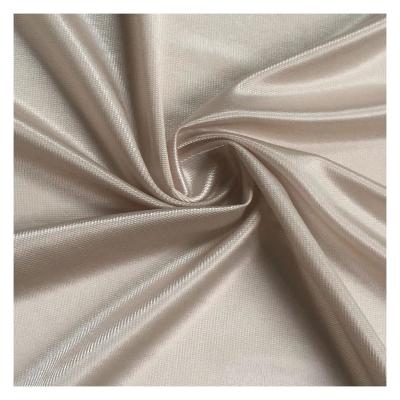 China Stretch 200gsm Shiny 68% 32% Nylon Spandex Satin Plain Dyed Knit Knit Fabric For Underwear Dress for sale