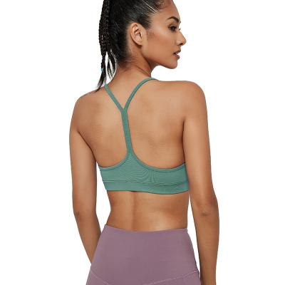 China Breathable Women's Seamless Strappy Top Wireless Camisole Sports Bra For Yoga Workout for sale