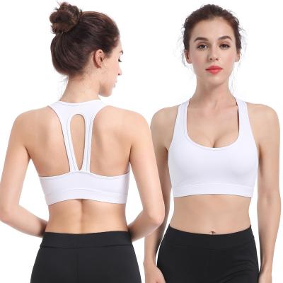 China Womens Sexy Wireless Strappy Breathable Sports Bra High Support With Removable Pads For Yoga for sale