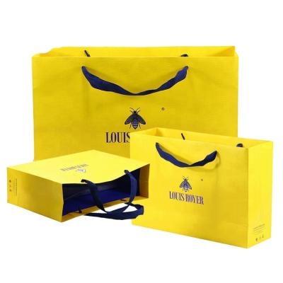 China Recyclable Color Paper Bag Supplier Customized Printed Shopping Bag Low Cost Luxury Retail Paper Bag for sale