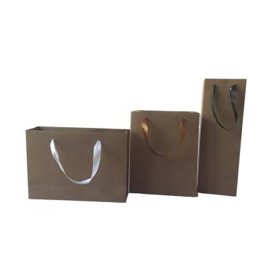 Cina Factory Wholesale Handmade Cheap Price Custom Recyclable Logo Brown Shopping Paper Bag Kraft Paper Bag in vendita