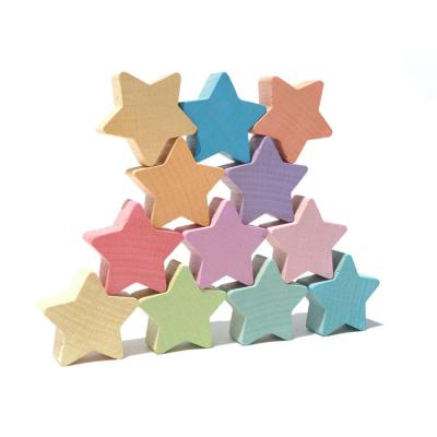 China Eco-friendly 12pcs Montessori Material Toys Rainbow Wooden Blocks Wooden Building Blocks Kids Wooden Stacking Stars for sale