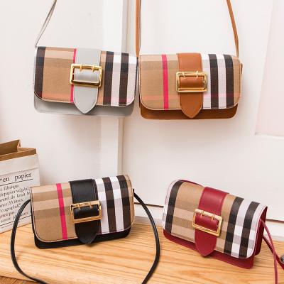 China Small Shoulder High Quality Plaid Messenger Retro Buckle Leather Student Single Handbag for sale