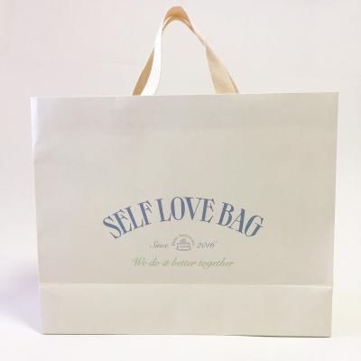 China Handmade widely used paper bag gift eco-housing security paper holiday gift bag for sale