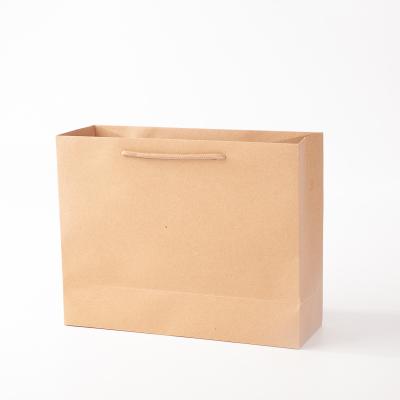 China Convenience Disposable Low Price Waterproof Handle Shopping Paper Bags With Logos for sale