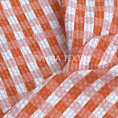 China Ocean Recycled Activewear Knit Fabric Gingham Jacquard Bikini Swimwear for sale