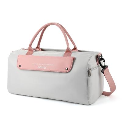 China 2021 High Quality Light Weight Fashion Pink Duffel Bag Oxford OEM Travel Oxford Style Letter Logo Unisex Carrying Handbag For Ladies Luxury for sale