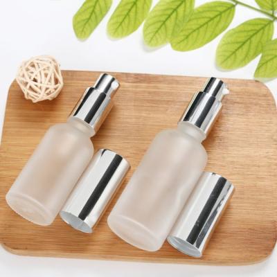 China 5ml-20ml-100ml Cosmetics Packaging Manufacturer Frosted Essential Glass Lotion Pump Bottle Cosmetics Spray Bottle for sale