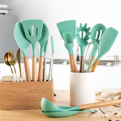 China Amazon Viable Hot Selling Wooden Handle 13 Pcs Accessories Spoons Wooden Kitchen Utensil Nonstick Silicone Cooking Tool Kit for sale