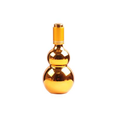 China Double Gourd Cosmetic Packaging Bottle Gold Plated Pure Clear Glass Spray Bottle for sale