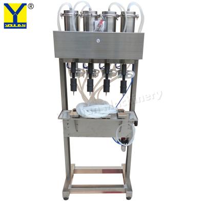 China YT-4 Pneumatic White Wine Filler Vaccum Liquid Glass Bottle Filling Machine for sale