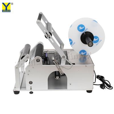 중국 MT-50C semi automatic round wine bottle paper sticker labeling machine for pet bottles cans 판매용