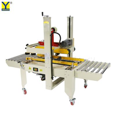 China FXA6050 Semi Automatic Electric Tape Box Carton Case Sealer Stripping and Sealing Machine en venta