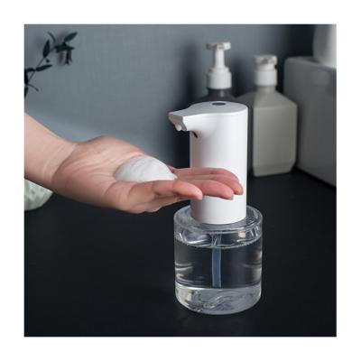 China 2022 Latest Style Foaming Soap Dispenser Round Bottle Liquid Foaming Dispenser Chargeable Touchless Automatic Soap Dispenser for sale