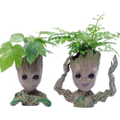 China DOULUO Wholesale Hot Sale Eco-friendly Groot Flower Pot Ornaments Promotional Gifts PVC Groot Pen Holder Flower Pot for sale