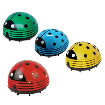 China Clean Dust Red Cute Beetle Shape Mini Desktop Vacuum Desk Dust Remover For Computer Keyboard for sale