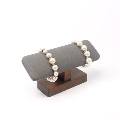 China Luxury Gray Wooden Frame Jewelry Bangle Display Stand Microfiber Scratching Jewelry Bracelet Watch Display Racks for sale