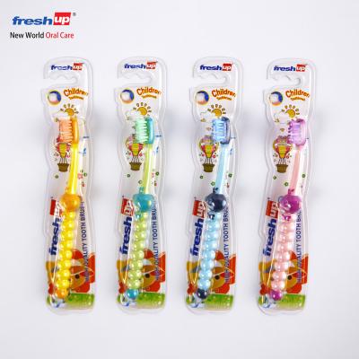 China Colorful worm children's toothbrush 220 popular handsome toothbrush manual smile for sale