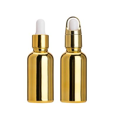 China Personal Care Custom Round Perfume 30ml Luxury Gold Glass Skin Care Storage Container Essential Oil Dropper Cosmetic Glass Bottle for sale