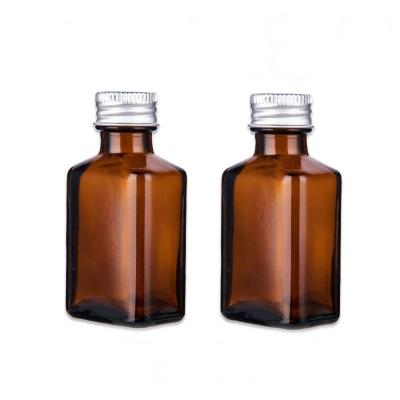 China Personal Care Square 30ml Amber Essential Oil Glass Bottle With Reducer And Twist Cap for sale