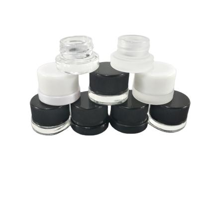 China 5ml 9ml Mini Clear Cosmetic Eye Cream Glass Jar With Safety Cap For Kids White Black for sale