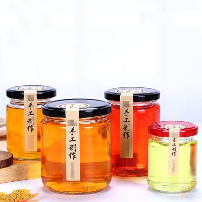 China Wholesale 35ml 50ml 100ml 200ml 250ml 350ml 500ml CANDY Empty Round Food Pickle Jam Jar Glass Honey Jar With Metal Lid for sale