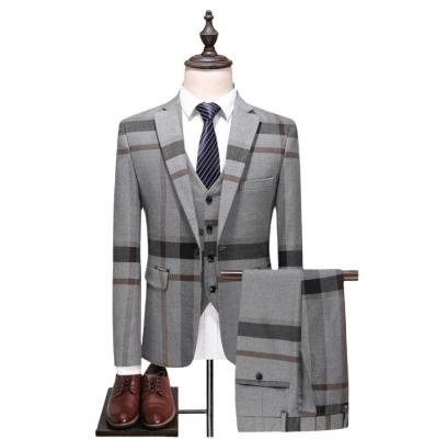 China Anti-wrinkle 2021 spring men's fashion temperament suit large plaid slim elegant three-piece suit for sale