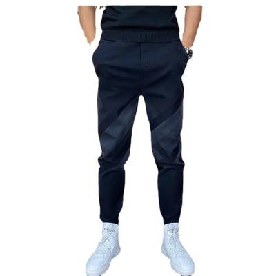 China European and American men's winter QUICK-DRY elastic dark gradient stripe sports gaiters loose jeans for sale