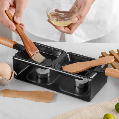 China Sustainable Wooden Handle BBQ Raclette Set Double Candlelight Table Melter Stick Non Rotaster Baking Tray Spatula Butter Cheese Oven Pan for sale