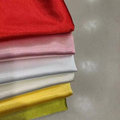 China Wholesale wind proof plain style textile high quality fabric satin woven crystal fabric for casual wear, jacket, sportswear for sale