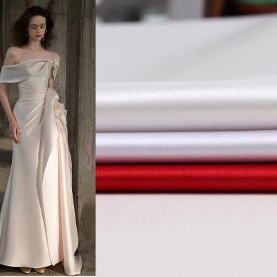 China Wind Proof No Moq 100d*100d 175GSM Wedding Dress Fabric Shiny Luxury for sale