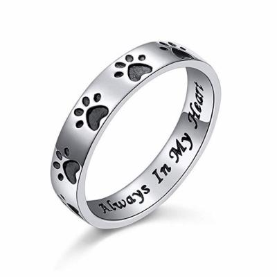 China Trendy Simple Silver Dog Cat Pet Paw Print Ring Fashion Stainless Steel Jewelry 8mm WidthPuppy for sale