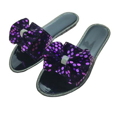 China CUSHIONING 2021 New Diamond Bowknot Sequin Crystal Plastic Casual Ladies Flat Slippers for sale