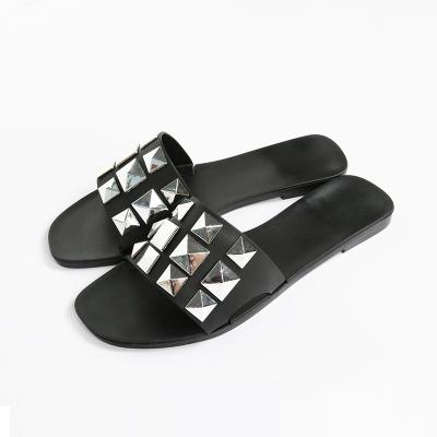 China CUSHIONING hot selling flat rivet design fashion PVC ladies freeze slipper sandals freeze slippers for women for sale