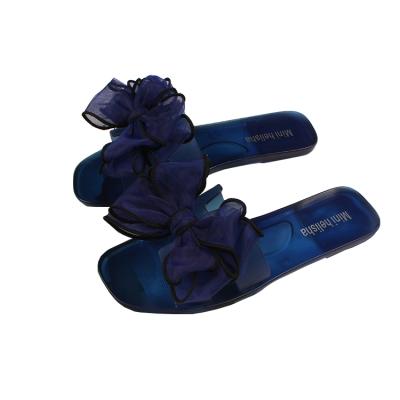 China CUSHIONING new fashion bow bottom casual wear transparent beach one word cool slippers freeze slippers for sale