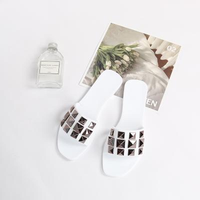 China Latest fashion CUSHIONING can be customized flat comfortable white jelly slippers jelly sandals for women for sale