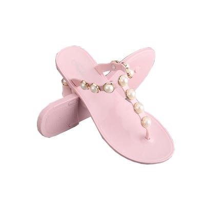 China CUSHIONING Fashionable All-match Pearl Flip Flops Beach Outdoor Sandals Freeze Flat Slippers For Women for sale