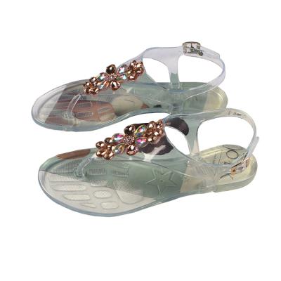 China CUSHIONING new diamond three-flower fashion casual flat flip-flop outdoor beach women's crystal sandals for sale